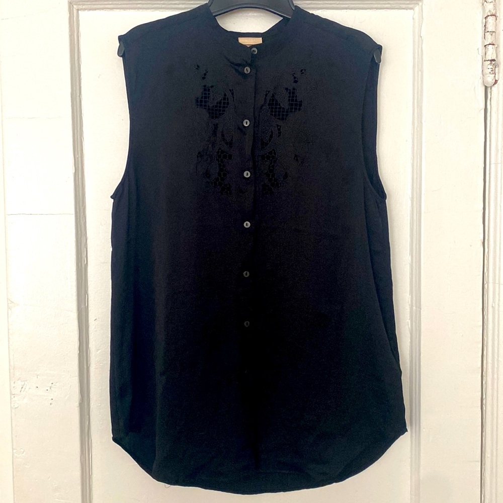 Black sleeveless embroidered button front top